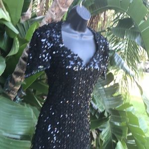 Vintage beaded sequins and fringed 1920s flapper dress